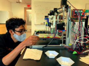 Raahi Desai working in a lab.