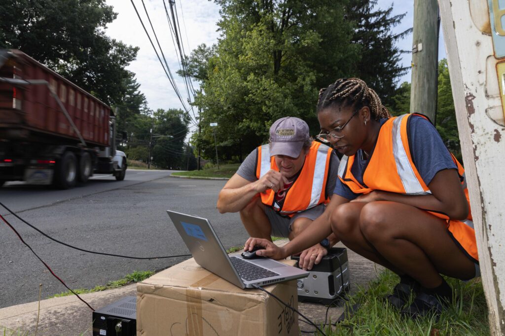Thomas Brennan, professor of civil engineering, conducts a field study with his research student, Alexia Watson, '27, civil engineering, on route 31, part of a MUSE project titled: "Implementation Performance Metrics for Converting Signalized Arterial Roadways into Human-Centric Transportation Systems."
